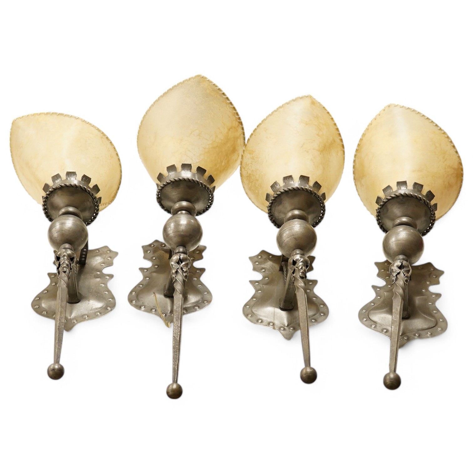 A set of four pewter and vellum shaded wall lights, made in Holland, 53cm high. Condition - good